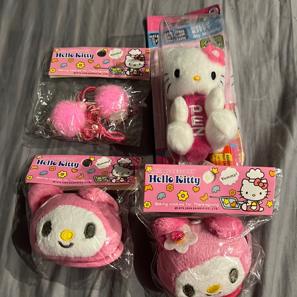 Accessories. Hello kitty Pez and My Melody hair ties.